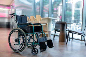Picture of a wheelchair in the middle of the room
