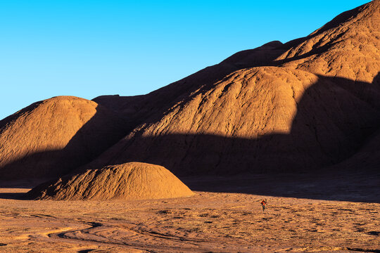 Man in El Diablo Desert, La Puna, Argentina landscape
