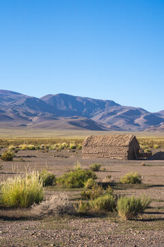 Remote adobe dwelling in La Puna's rugged terrain