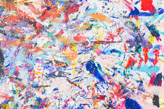 Naklejki Venetian mask workshop with vibrant paint splatters
