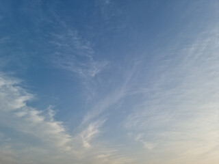 It's a sunset sky with fluffy clouds.