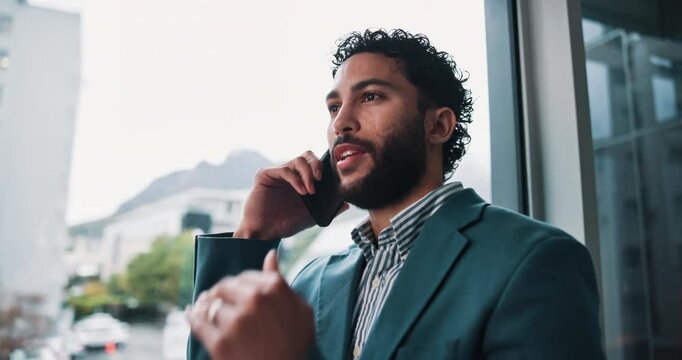 Businessman, conversation and window with phone call for negotiation or discussion at office. Man, employee or consultant talking with mobile smartphone for financial advice or chat at workplace