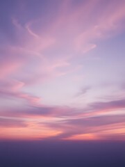 Fototapeta premium Serene and dramatic sunset sky displaying pastel hues of pink purple and orange colors