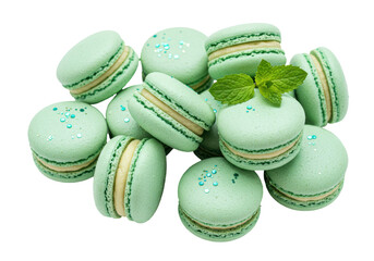 Isolated Pile of Mint Green Macarons with a Sprig of Mint