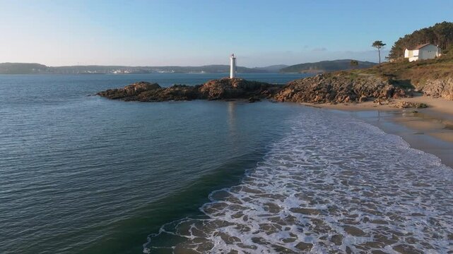 Flying Towards The Praia do Lago Towards The Fazo baliza do Lago In Muxia, A Coru&ntilde;a, Spain. - aerial shot