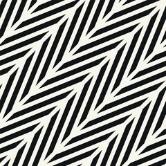 Seamless vector pattern with bold diagonal zigzag. Abstract monochrome background featuring dynamic striped tiles. Suitable for use as a swatch in Illustrator.
