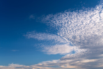 Blue sky with clouds. Nature background.