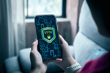 Smartphone screen shows VPN with security system. Concept of Virtual Private Network, technology for connecting private network to public internet to hide user IP address, and online network security.