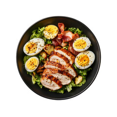 Delicious Grilled Chicken Caesar Salad with Hard-Boiled Eggs and Crispy Bacon in Black Bowl