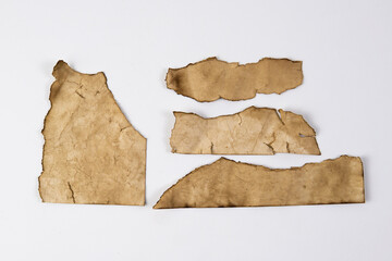 Recycled paper on a white background. Brown paper torn or ripped pieces of paper isolated on white background.