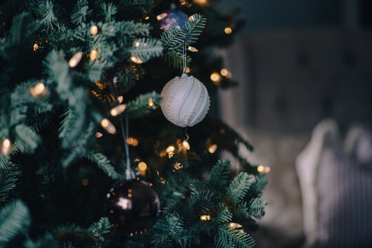 xmas bauble on tree with lights