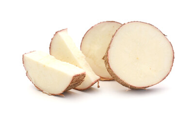 Cutting and whole manioc (cassava) isolated on white background.