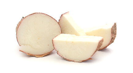 Cutting and whole manioc (cassava) isolated on white background.