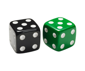 A close up shot of a black die and a green die with white dots on a black background in a studio shot isolated white background