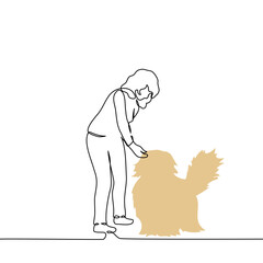 woman bending over and petting fluffy dog ​​on the head - one line art vector. concept passerby dog ​​lover, owner and pet, veterinarian and patient