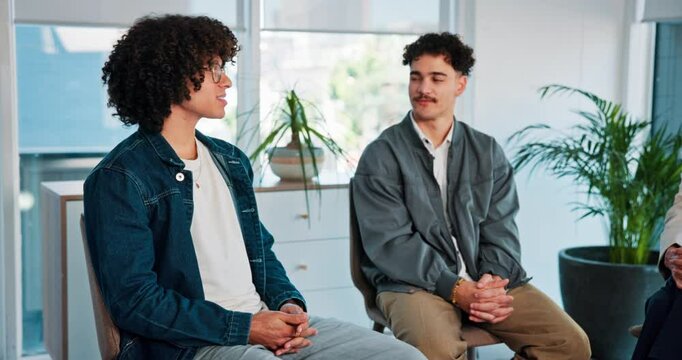 Men, discussion and support group with therapy in workplace for mental health, listen and smile at office. Business people, talk and happy in circle, empathy and solidarity in counselling session