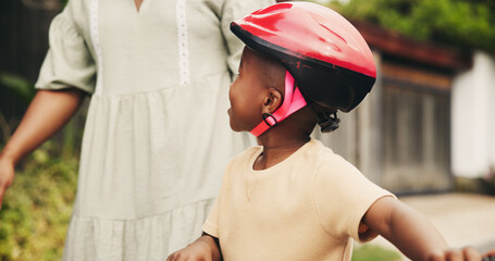 Support, outdoor and boy on bicycle with parent on neighborhood street for child development....