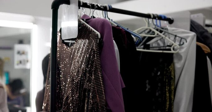 Clothes, rack and fashion for photoshoot, production and behind the scenes for stylist person and planning. Creative, professional and setup with media agency, backstage and choice for magazine