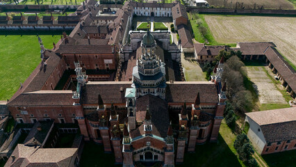 Aerial view of the Certosa di Pavia, built in the late fourteenth century, courts and the cloister of the monastery and shrine in the province of Pavia, Lombardia, Italy