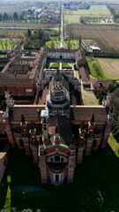 Aerial view of the Certosa di Pavia, built in the late fourteenth century, courts and the cloister of the monastery and shrine in the province of Pavia, Lombardia, Italy