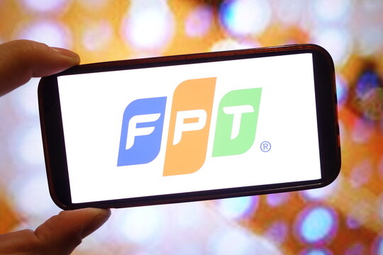 Konskie, Poland - February 20, 2025: FPT Corporation company logo displayed on mobile phone