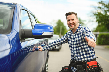 Man engineer builder in front of his pickup © Louis-Paul Photo
