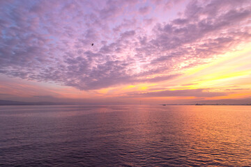 Fototapeta premium clouds and sunrise over the marmara sea, izmit