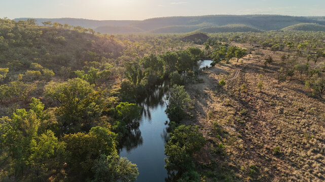 Aerial of river running through remote bushland