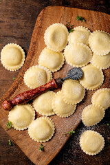 Fresh Homemade Ravioli on Wooden Board