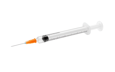 Syringe with a black and orange tip