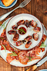 Elegant appetizer featuring bacon-wrapped dates.