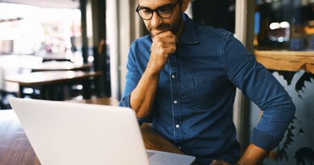 Thinking, laptop and man in cafe with ideas for startup business with creative project. Planning, computer and male journalist with freelance career at online magazine for publishing at coffee shop.
