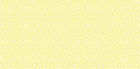 White small polka dot pattern on pastel yellow background.