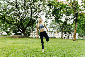 Yoga practice in urban park woman stretching outdoor fitness environment serene viewpoint