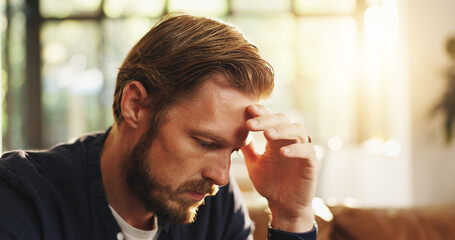 Stress, man and thinking with worry at house for bad decision, financial crisis or reflection....