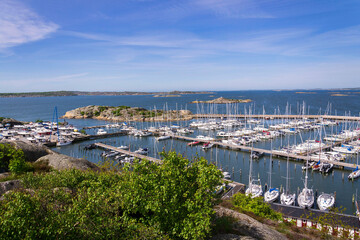 Ships harbour at Saltholmen peninsula on the shore of Alvsborgsfjorden, harbour for archipelago ships, Alvsborg district, Gothenburg, Sweden, sunny day