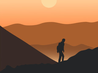 Hiker silhouette climbing mountain at sunset with warm orange sky and hills