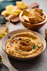 Delicious hummus with olive oil, chickpeas and parsley