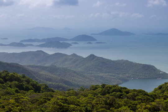 Lantau Island, Hong Kong, 10-20-2024 Views over Lantau Island seen from the cable car which connects downtown Tung Chung and Ngong Ping with the statue of the biggest buddha and the Po Lin Monastery