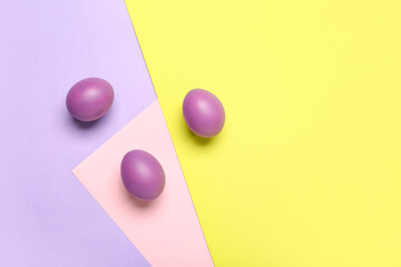 Painted Easter eggs on colorful background