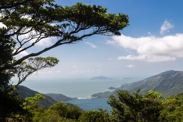 Lantau Island, Hong Kong, 10-20-2024 Views over Lantau Island seen from the cable car which connects downtown Tung Chung and Ngong Ping with the statue of the biggest buddha and the Po Lin Monastery