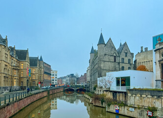 Fototapeta premium Cinematic wide-angle photograph of gothic-style architecture in Ghent
