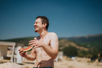 A cheerful individual relishing a slice of watermelon, embracing summer joy and leisure outdoors.