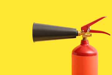 Fire extinguisher on yellow background
