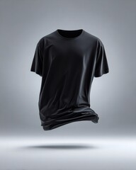 Black t-shirt suspended weightlessly over neutral gray backdrop, highlighting minimalist fashion design and graphic potential