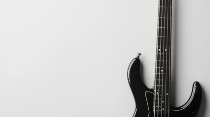 A bass guitar with a smooth neck and strings, space for text on the right, set against a white background