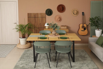 Interior of dining room with table, chairs and guitar
