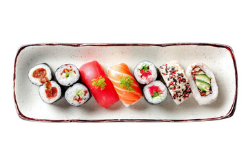 Variety of sushi rolls and nigiri on ceramic plate top view isolated on transparent background
