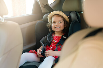 Cute little baby child sitting in car seat. Portrait of cute little baby child sitting in car seat.Safety concept.