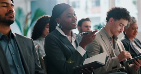 Woman, listen and happy with notebook at convention for training, presentation or review at company. People, employees and smile with attention, notes and insight with point at financial conference - Powered by Adobe